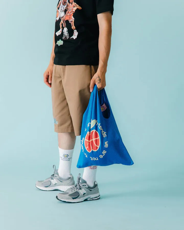 we are not friends tote bag basketball