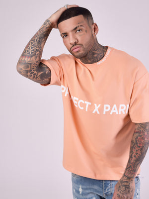 project x paris camiseta logo oversize peach